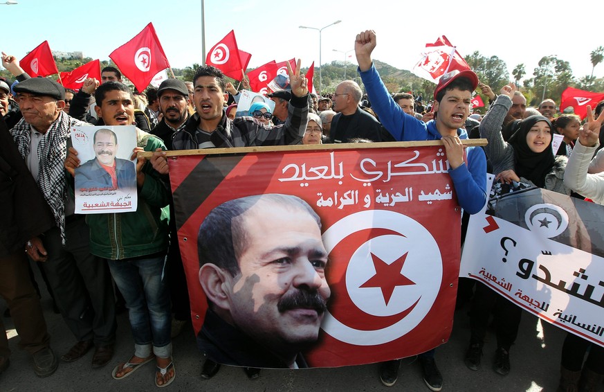 Wut über die Ermordung des Oppositionspolitikers Belaïd: Demonstranten protestieren gegen die tunesische Regierungspartei Ennahda.