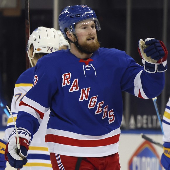 New York Rangers&#039; Alexis Lafreniere (13) celebrates his goal against the Buffalo Sabres during the third period of an NHL hockey game Tuesday, April 27, 2021, in New York. (Bruce Bennett/Pool Pho ...