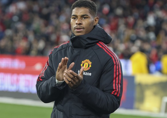Manchester United's Marcus Rashford reacts with the crowd following a pre-season game between Manchester United and Crystal Palace at the Melbourne Cricket Ground in Melbourne, Australia, Tuesday, July 19, 2022. (AP Photo/Asanka Brendon Ratnayake)
