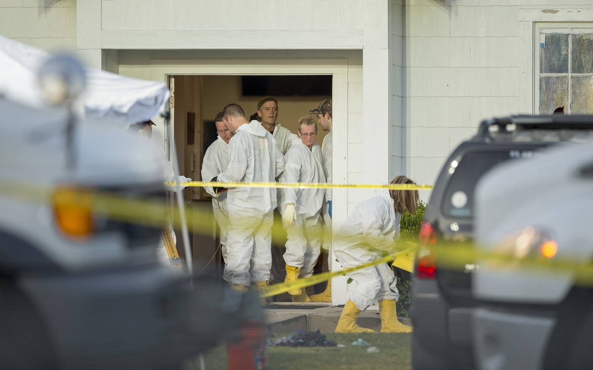 Investigators work at the scene of a deadly shooting at the First Baptist Church in Sutherland Springs, Texas, Sunday Nov. 5, 2017. A man opened fire inside of the church in the small South Texas comm ...