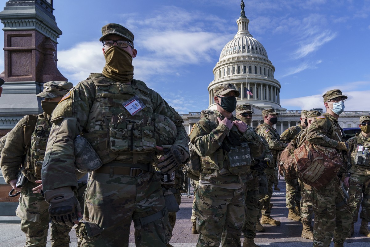 National Guard troops reinforce security around the U.S. Capitol ahead of expected protests leading up to President-elect Joe Biden's inauguration, in Washington, Sunday, Jan. 17, 2021, following ...