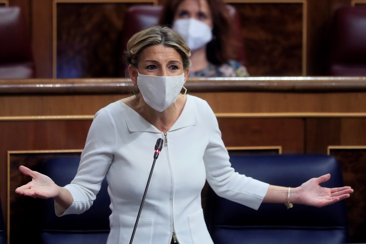 epa09210987 Spanish Labor Minister Yolanda Diaz delivers a speech during a new Spanish Government's Question Time session at the Lower Chamber in Madrid, Spain, 19 May 2021. The session is focuse ...