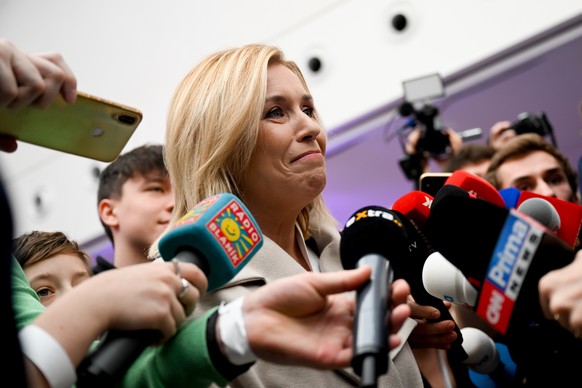 epa10405087 Danuse Nerudova, an independent candidate for the Czech presidential elections arrives for press briefing at her election headquartes in Prague, Czech Republic, 14 January 2023. According  ...