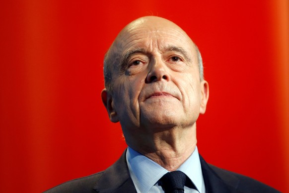 French presidential hopeful Alain Juppe, seeking to win his centre-right Les Republicains party's nomination in primaries in November, attends a political rally in Paris, France, May 10, 2016. RE ...