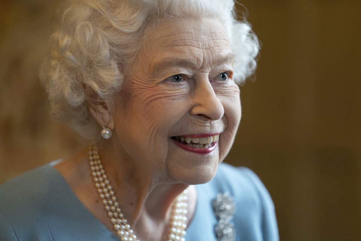 Britain's Queen Elizabeth II smiles during a reception with representatives from local community groups to celebrate the start of the Platinum Jubilee, at Sandringham House, her Norfolk residence ...