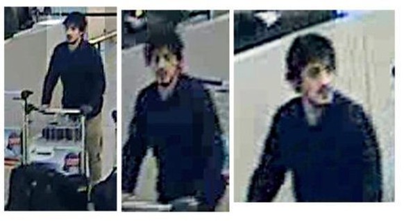 epa05226547 A handout image provided by Belgian Federal Police shows a CCTV grab of one of the three suspects in the Zaventem airport attack in Brussels, Belgium, 22 March 2016. A surveillance camera  ...