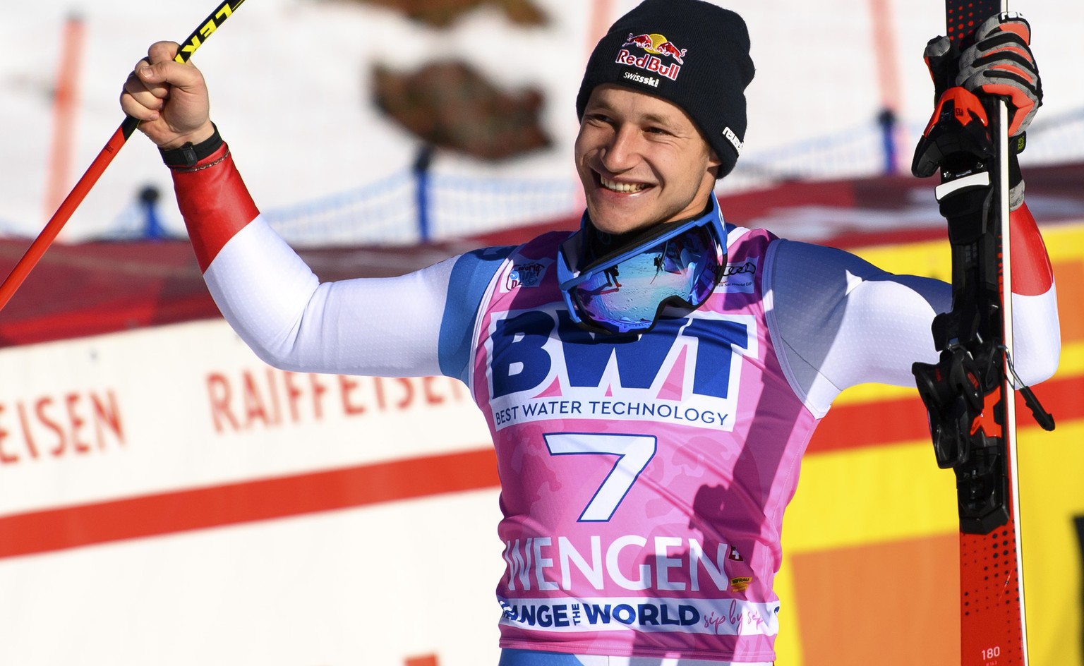 Winner Marco Odermatt of Switzerland celebrates during the victory ceremony on the podium after the men&#039;s super-g race at the Alpine Skiing FIS Ski World Cup in Wengen, Switzerland, Thursday, Jan ...