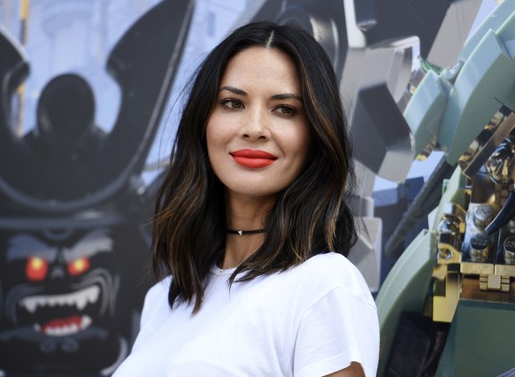 FILE - In this July 21, 2017 file photo, actress Olivia Munn attends &quot;The Lego Ninjago Movie&quot; photo op at Comic-Con International in San Diego. Munn along with five other women have accused  ...