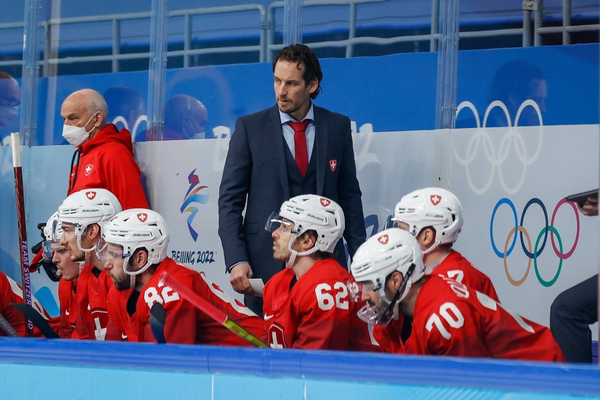 epa09750341 Switzerland head coach Patrick Fischer during the Men&#039;s Ice Hockey preliminary round match between Switzerland and Denmark at the Beijing 2022 Olympic Games, Beijing, China, 12 Februa ...