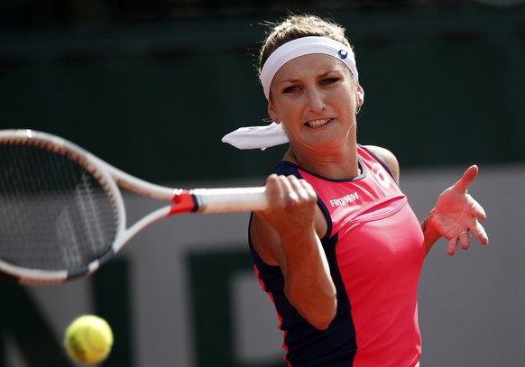 epa06001834 Timea Bacsinszky of Switzerland plays against Madison Brengle of the USA during their womenâs single 2nd round match during the French Open tennis tournament at Roland Garros in Paris, F ...