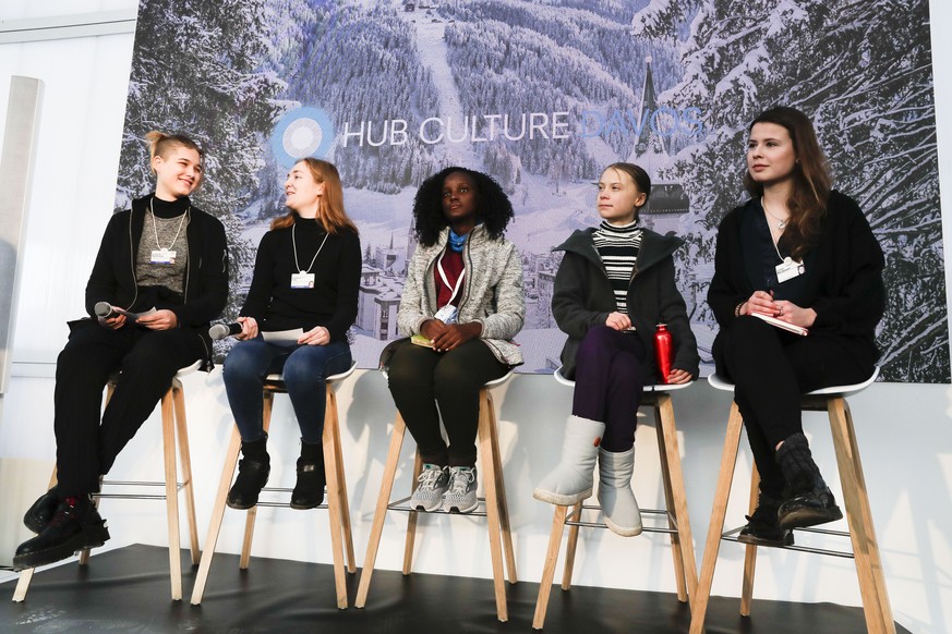 Climate activists Isabelle Axelsson, Loukina Tille, Vanessa Nakate, Greta Thunberg, and Luisa Neubaue,, from left, arrive for a news conference in Davos, Switzerland, Friday, Jan. 24, 2020. The 50th a ...