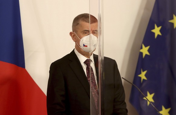 Czech Prime Minister Andrej Babis with face mask listen to Slovenia's Prime Minister Janez Jansa, Bulgaria's Prime Minister Boyko Borissov and Austrian Chancellor Sebastian Kurz behind plexiglass shields during a joint press conference at the federal chancellery in Vienna, Austria, Tuesday, March 16, 2021. (AP Photo/Ronald Zak)