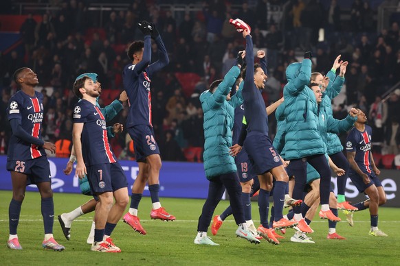 epa11908716 Players of PSG celebrate with their supporters after winning the UEFA Champions League knockout phase play-offs 2nd leg soccer match between Paris Saint-Germain and Stade Brest, in Paris,  ...