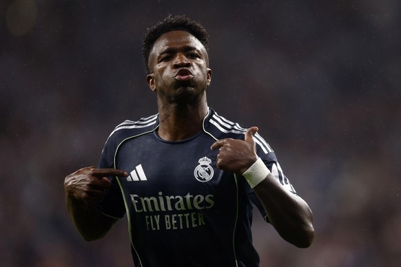 epa12930759 Real Madrid's Vinicius Junior celebrates after scoring the 0-2 goal during the Spanish LaLiga soccer match between RCD Espanyol and Real Madrid, in Barcelona, Catalonia, Spain, 03 May ...