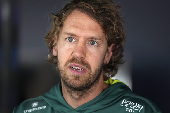 File---File photo shows Aston Martin driver Sebastian Vettel of Germany answering to questions of journalists during interviews ahead of the Austrian Formula One Grand Prix at the Red Bull Ring racetr ...
