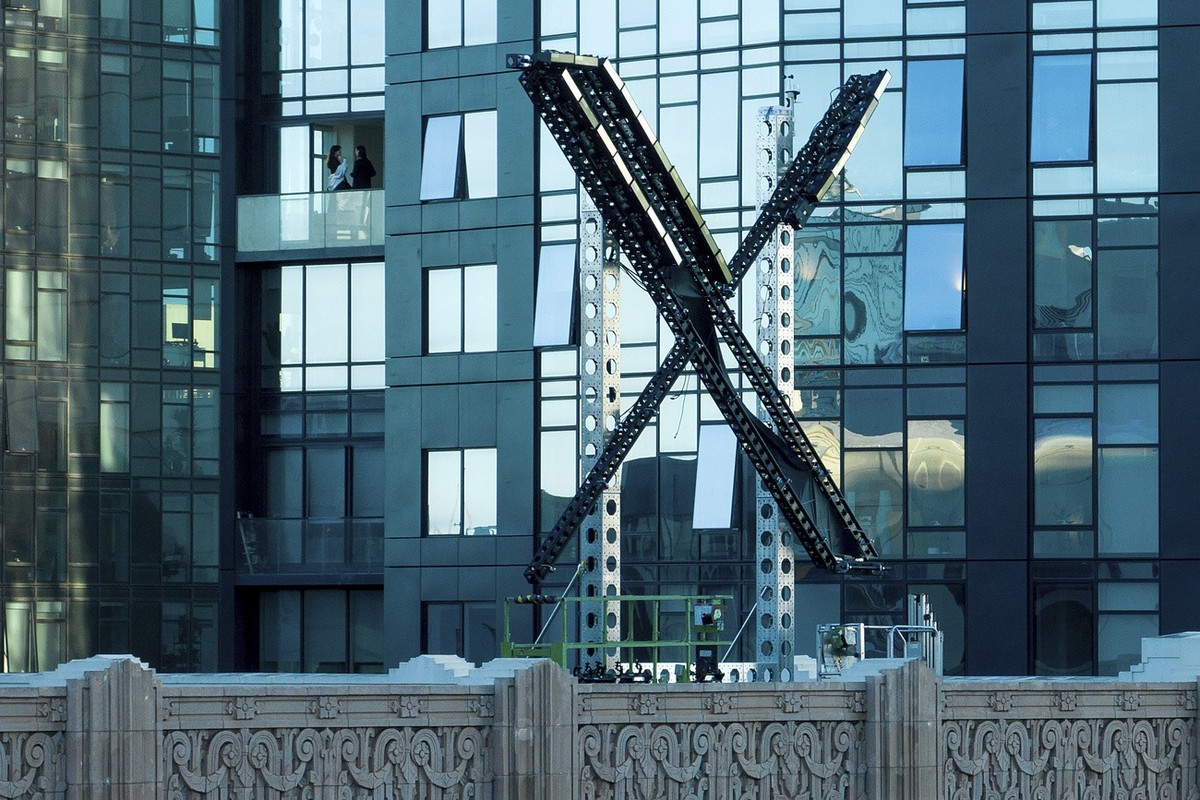 A partially completed "X" sign rests atop the company headquarters, formerly known as Twitter, in downtown San Francisco, on Friday, July 28, 2023. San Francisco has launched an investigatio ...