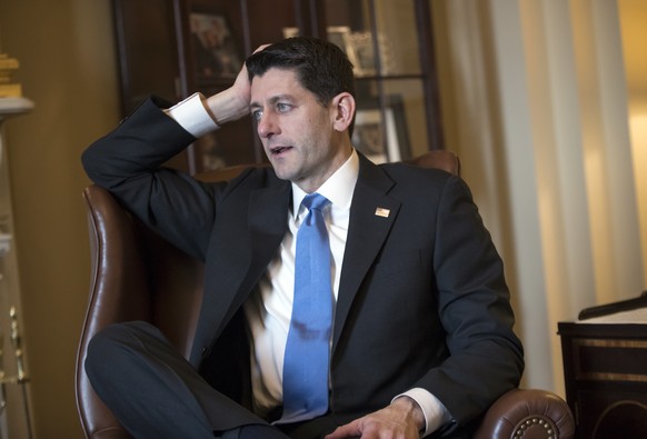 House Speaker Paul Ryan, R-Wis., speaks in his office just after final approval of the Republican rewrite of the tax code, during an interview with The Associated Press at the Capitol in Washington, T ...