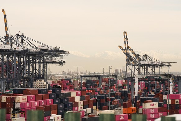 Containers are stacked at the Port of Los Angeles Friday, Feb. 20, 2026, in Los Angeles. (AP Photo/Damian Dovarganes)
Trump Tariffs