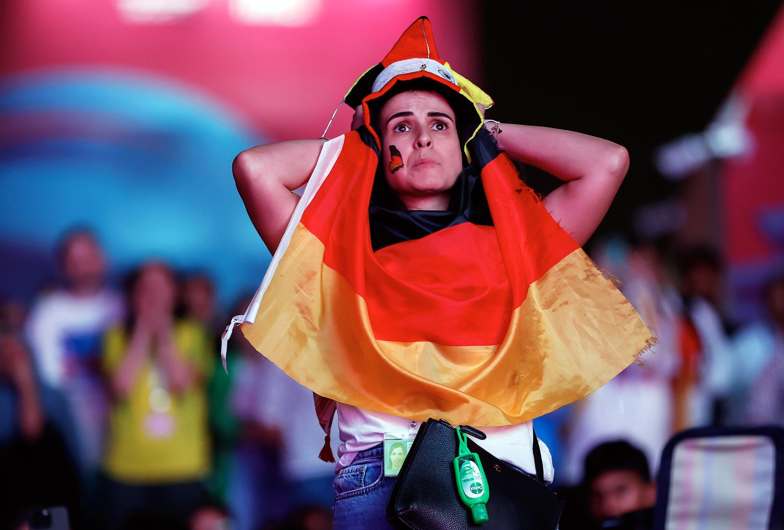 epa10322926 A fan of Germany reacts while watching the FIFA World Cup 2022 group E soccer match between Germany and Japan at Fan Festival grounds in Doha, Qatar, 23 November 2022. EPA/ROLEX DELA PENA