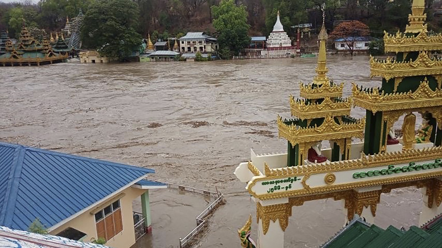 In this photo provided by Myanmar Military True News Information Team on Monday, May 15, 2023, a flooded area caused by Cyclone Mocha is seen near Mann Shwe Sat Taw pagoda in Magwe Division, central M ...