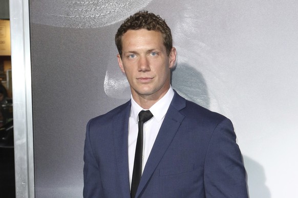 Johnny Wactor arrives at the world premiere of &quot;The Mule&quot; on Dec. 10, 2018, in Los Angeles. Police have released images of three suspects and the getaway car used in the killing of the forme ...