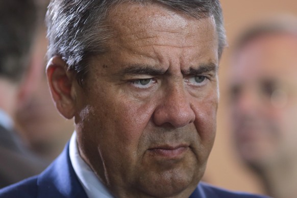 German Foreign Minister and Vice Chancellor Sigmar Gabriel arrives to lead the cabinet meeting of the German government at the chancellery in Berlin, Wednesday, Aug. 2, 2017. (AP Photo/Markus Schreibe ...