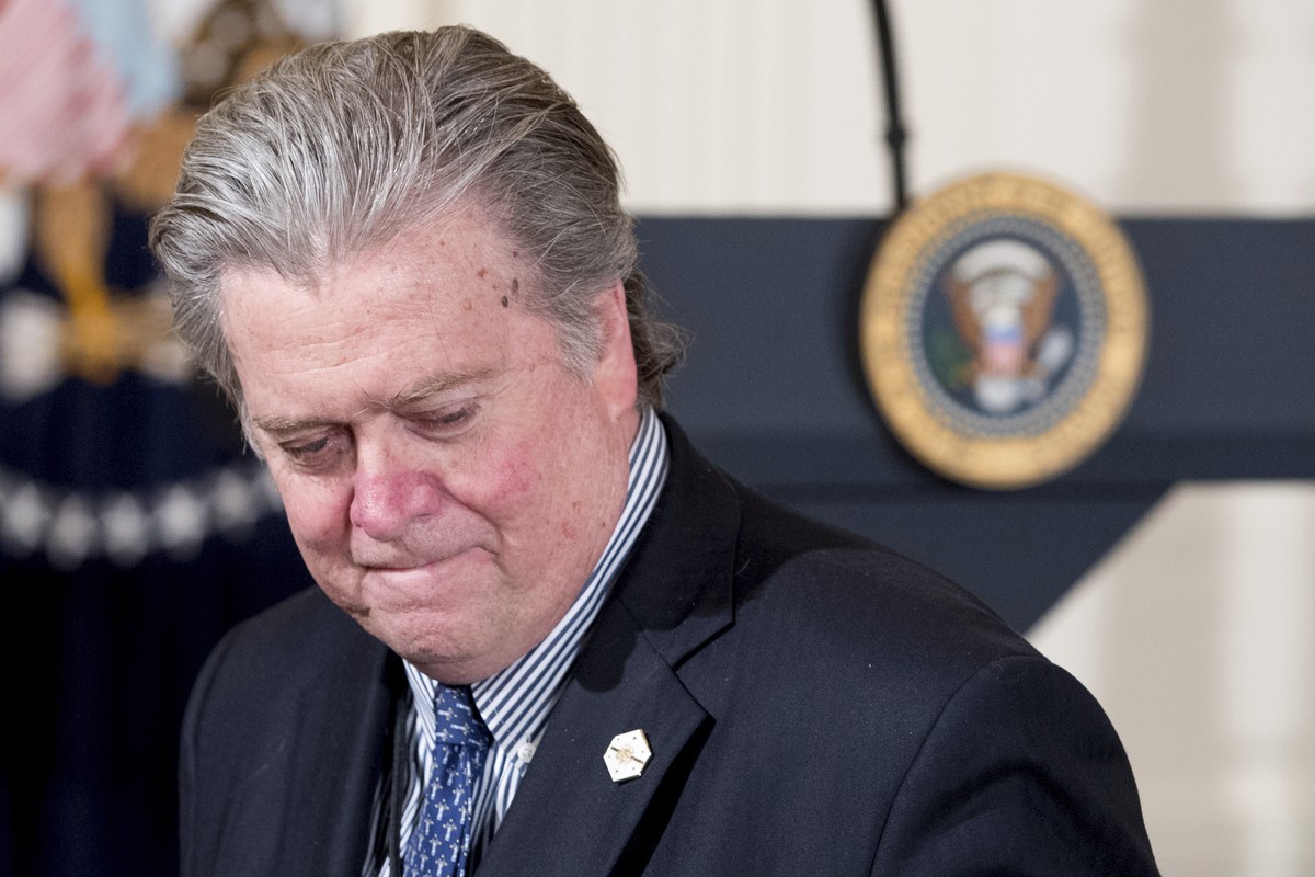 In this photo taken Feb. 16, 2017, President Donald Trump's White House Senior Adviser Steve Bannon arrives for a news conference with President Donald Trump in the East Room of the White House i ...