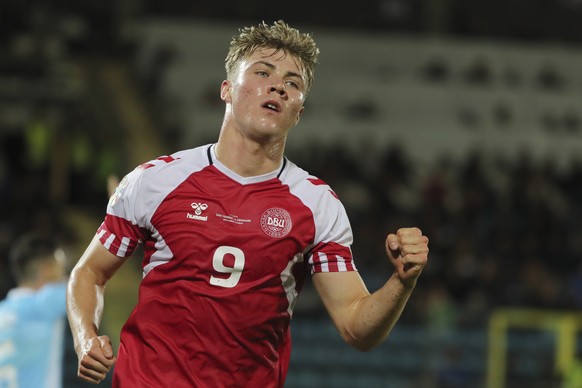 Denmark&#039;s Rasmus Hojlund celebrates after scoring his side&#039;s opening goal during the Euro 2024 group H qualifying soccer match between San Marino and Denmark at the San Marino Stadium in Ser ...