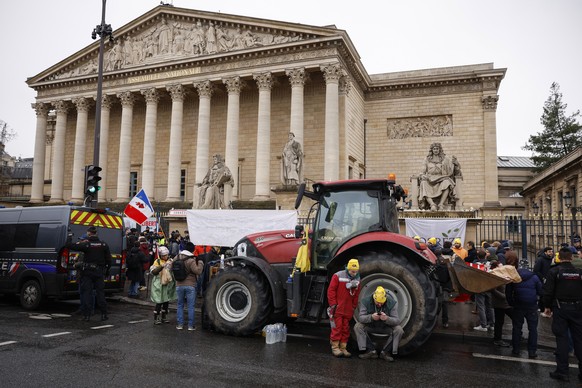 epa12636174 French farmers park their tractors by the National Assembly during a demonstration, as part of a nationwide day of protests and actions called by several farmers' unions to push the F ...
