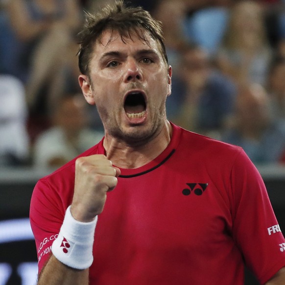 Switzerland&#039;s Stan Wawrinka celebrates a point against Slovakia&#039;s Martin Klizan during their first round match at the Australian Open tennis championships in Melbourne, Australia, Monday, Ja ...