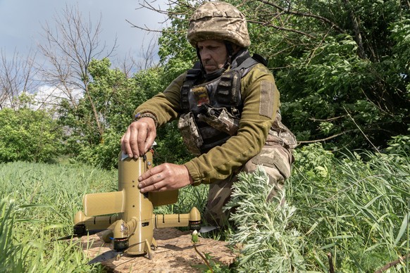 A Ukrainian soldier prepares an interceptor drone during a Russia's aerial attack at an undisclosed location near Kharkiv, Ukraine, Monday, May 25, 2026. (AP Photo/Andrii Marienko)
Russia Ukraine ...