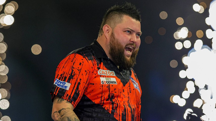 Darts PDC World Darts Championship Michael Smith celebrates winning the match during the PDC World Darts Championship Semi Final at Alexandra Palace, London, United Kingdom on 2 January 2023. Editoria ...