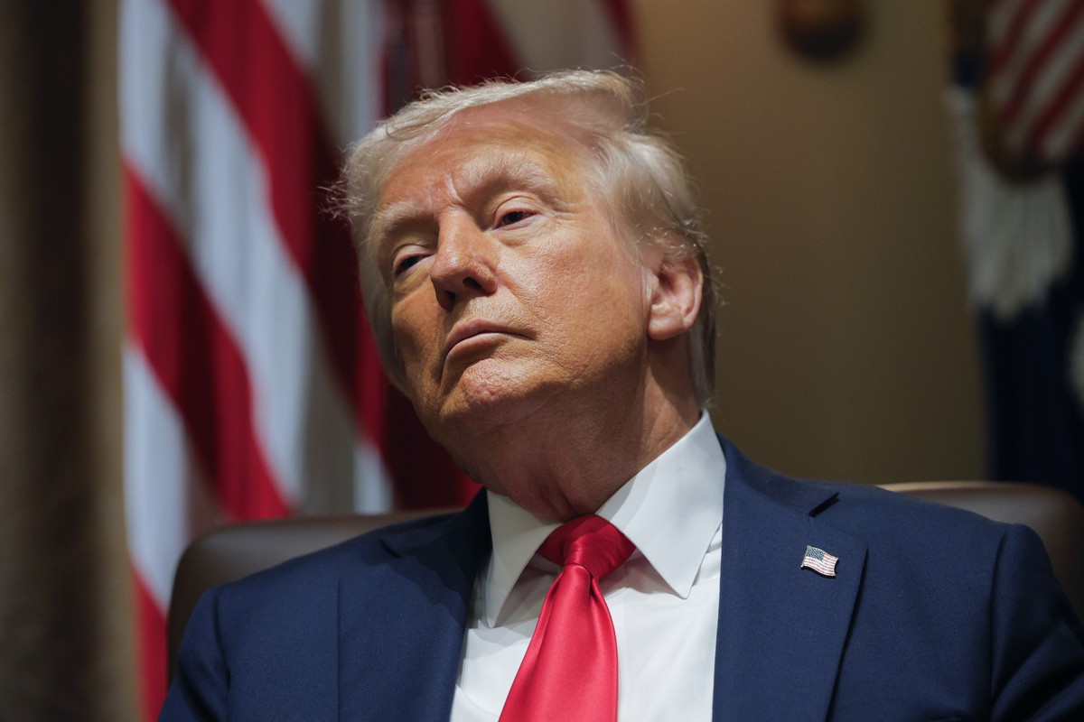 President Donald Trump listens during a Cabinet meeting at the White House in Washington, Wednesday, Feb. 26, 2025. (Pool via AP)
Trump
