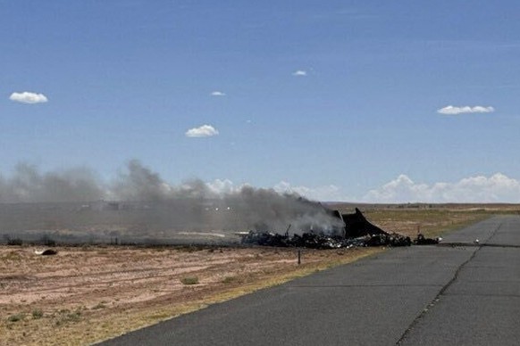 This image released by the Navajo Nation Police Department shows a medical transport plane after it crashed near the airport in Chinle, Ariz., on Tuesday, Aug. 5, 2025. (Navajo Nation Police Departmen ...
