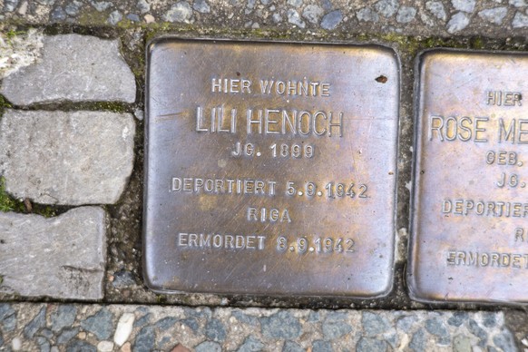 A Stolperstein (&quot;stumbling stone&quot;) to commemorate former German athlete Lilli Henoch outside her former home in Berlin, Wednesday, Aug. 2, 2023. Henoch coached athletes at the Bar Kochba Ber ...