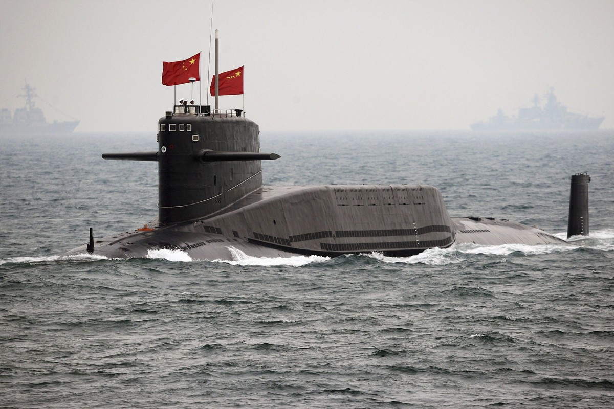 FILE - In this April 23, 2009 file photo, a Chinese Navy nuclear-powered submarine sails during an international fleet review to celebrate the 60th anniversary of the founding of People's Liberat ...