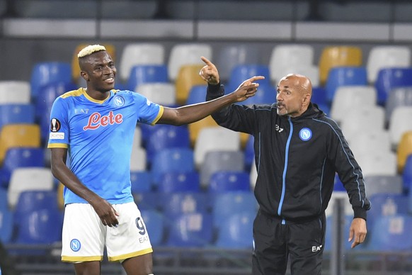 epa09537781 Napoli���s forward Victor Osimhen celebrates with his coach Luciano Spalletti after scoring the 2-0 lead during the UEFA Europa League group C soccer match between SSC Napoli and Legia War ...