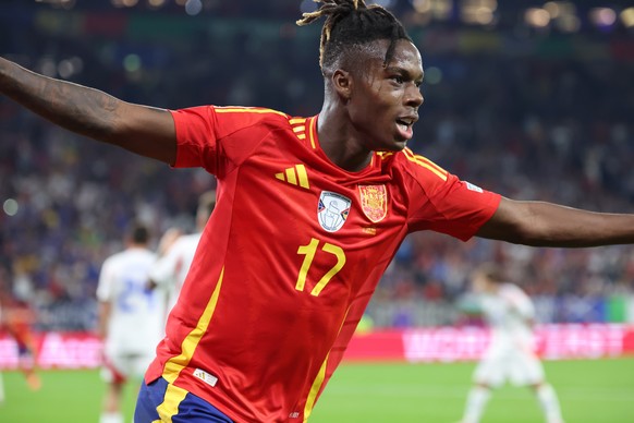 epa11426724 Nico Williams of Spain celebrates Italy&#039;s own goal putting the score 0-1 during the UEFA EURO 2024 group B soccer match between Spain and Italy, in Gelsenkirchen, Germany, 20 June 202 ...
