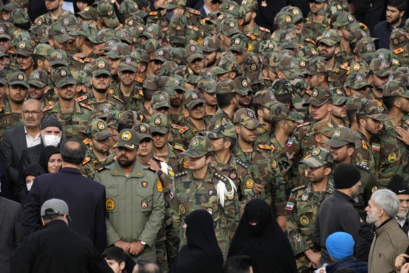 Iranian army cadets and officers attend the funeral ceremony of Seyed Razi Mousavi, a high ranking Iranian general of the paramilitary Revolutionary Guard, who was killed in an alleged Israeli airstri ...