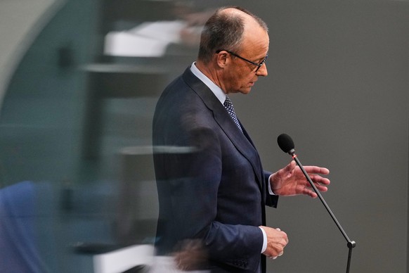 German Chancellor Friedrich Merz speaks during a Q&amp;A at the German parliament Bundestag in Berlin, Germany, Wednesday, March 25, 2026. (AP Photo/Markus Schreiber)
Germany Politics