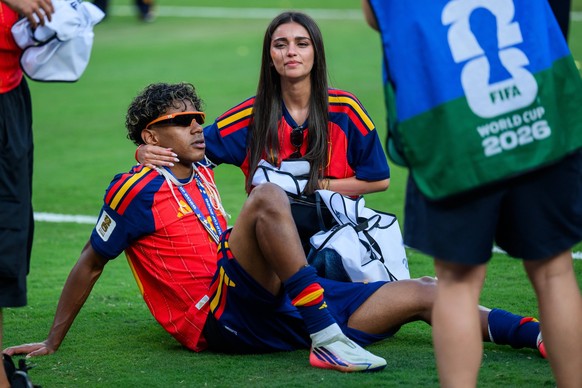 260719 Lamine Yamal of Spain with his girlfriend Ines Garcia Santos after the FIFA World Cup, WM, Weltmeisterschaft, Fussball 2026 final football match between Spain and Argentina on July 19, 2026 in  ...