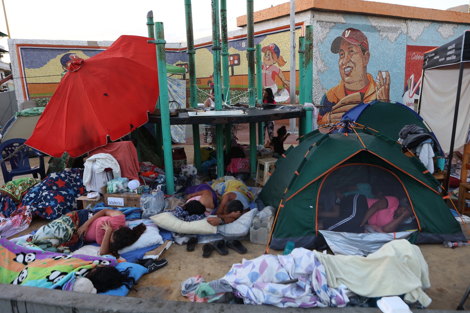 People whose homes were damaged by earthquakes sleep outside a baseball stadium in Catia La Mar, Venezuela, Sunday, June 28, 2026.(AP Photo/Pedro Mattey)
Venezuela Earthquake