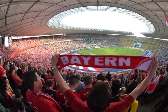 epa05321875 Bayern Munich fans cheer prior to the German DFBÂ Cup final soccer match between Bayern Munich and Borussia Dortmund at the Olympic Stadium in Berlin,Â Germany, 21 May 2016. 
(EMBARGOÂ CO ...