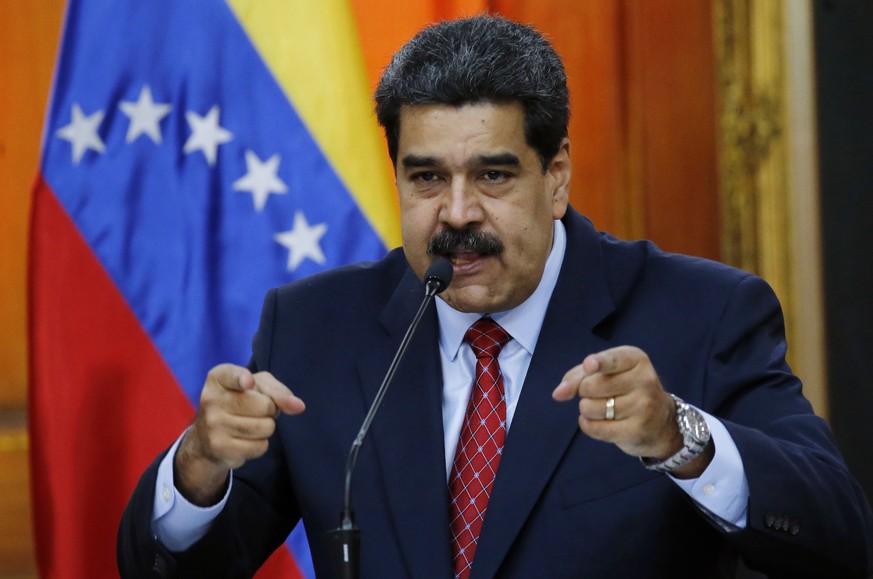FILE - In this file photo dated Friday, Jan. 25, 2019, Venezuelan President Nicolas Maduro gives a press conference at Miraflores presidential palace in Caracas, Venezuela. More than a week into a pol ...