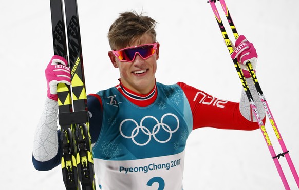 Johannes Hoesflot Klaebo, of Norway, celebrates after winning the men&#039;s cross-country skiing sprint classic at the 2018 Winter Olympics in Pyeongchang, South Korea, Tuesday, Feb. 13, 2018. (AP Ph ...