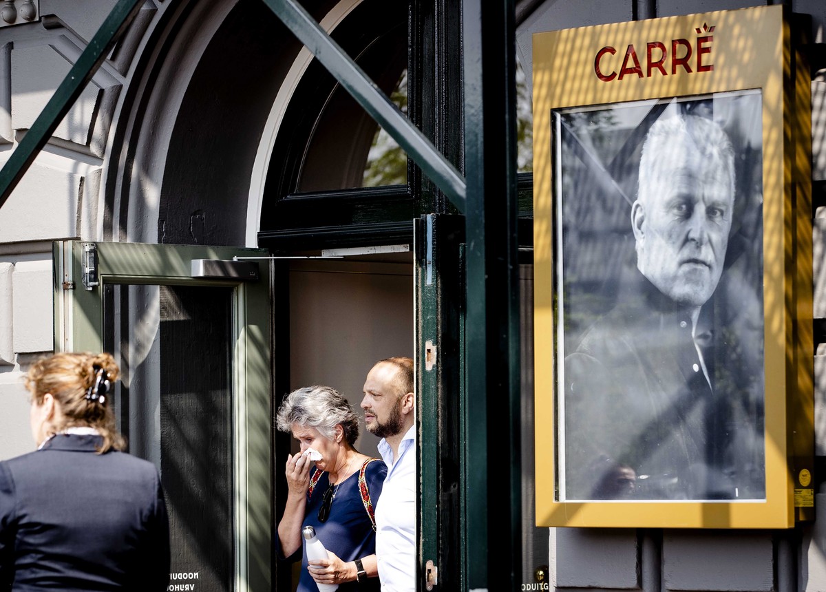 epa09356756 People leave the Royal Theater Carre during the public farewell of Peter R. de Vries in Amsterdam, The Netherlands, 21 July 2021. The crime reporter died at the age of 64 after being shot  ...