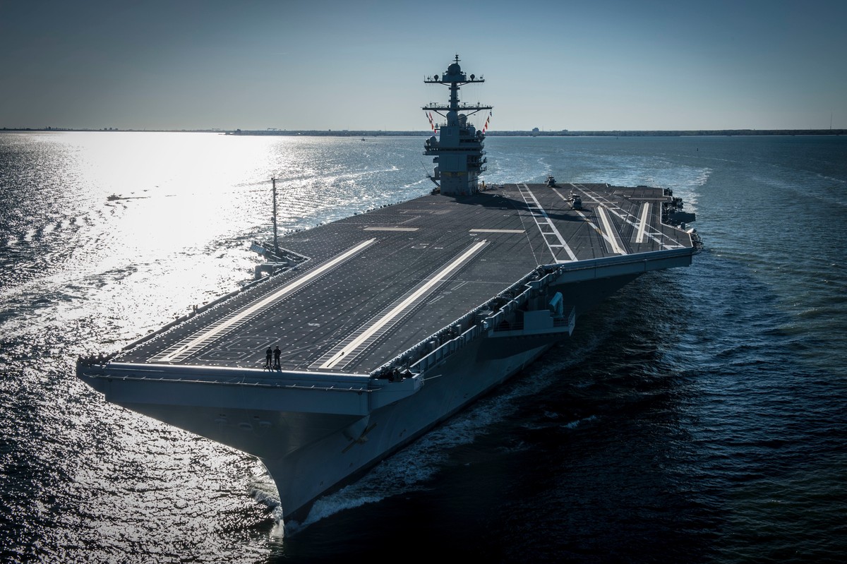 FILE - In this photo provided by the U.S. Navy, the USS Gerald R. Ford embarked on the first of its sea trials to test various state-of-the-art systems on its own power for the first time, April 8, 20 ...