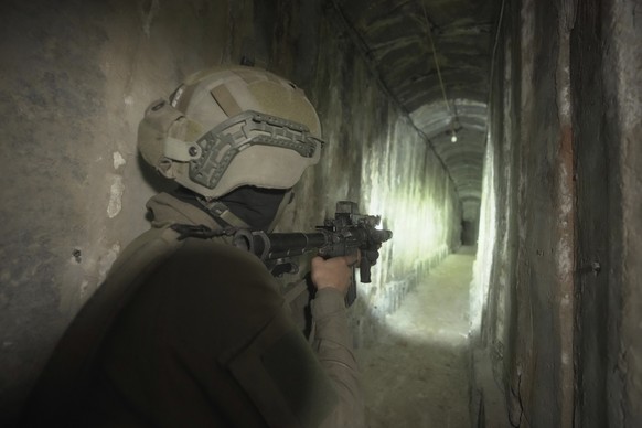 INSTRUCTIONS UPDATES - Israeli soldiers show the media an underground tunnel found under Shifa Hospital in Gaza City, Wednesday, November 22, 2023. Israel says Hamas militants took cover on the…