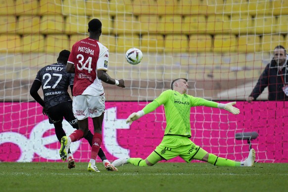 Monaco&#039;s goalkeeper Philipp Koehn saves a shot from Metz&#039;s Danley Jean Jacques, left, during the French League One soccer match between AS Monaco and FC Metz, at the Stade Louis II in Monaco ...