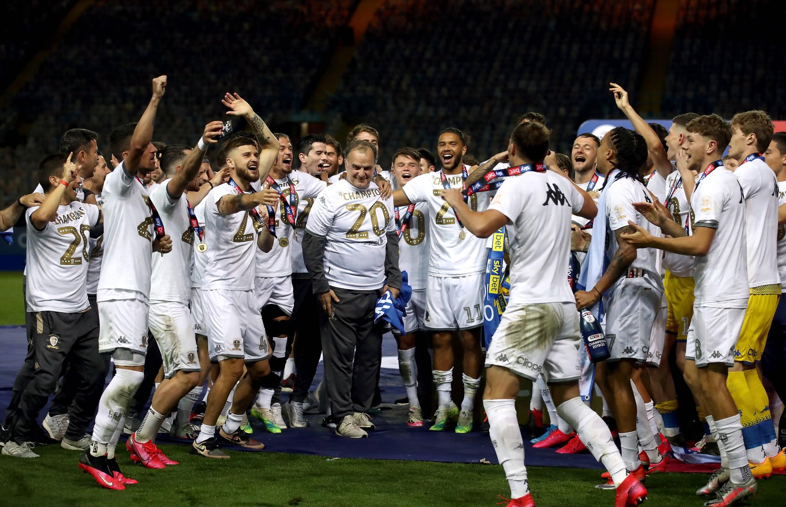 Leeds United v Charlton Athletic - Sky Bet Championship - Elland Road Leeds United manager Marcelo Bielsa with his players as they lift the Sky Bet Championship trophy after the match at Elland Road,  ...